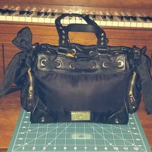 Juicy Couture Black Malibu Daydreamer Bag with bows.  Trimmed in Gold
